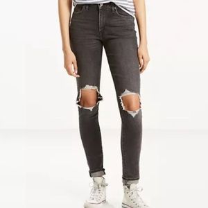 Levi’s high rise skinny distressed black jeans.